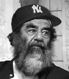 This is a photo of either a Linux programmer or Saddam Hussein.