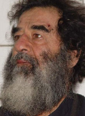 This is a photo of either a Linux programmer or Saddam Hussein.